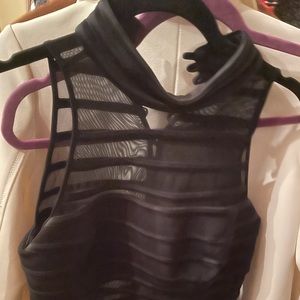 Vintage Cache elegant black top w buttons in back.